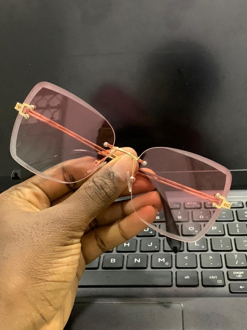 MAROON RIMLESS GLASSES